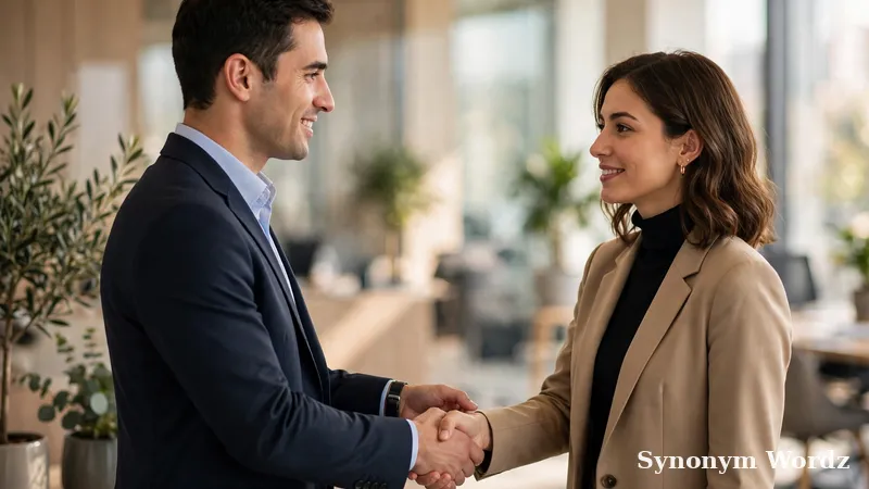 Two colleagues shaking hands in agreement after a respectful business decision