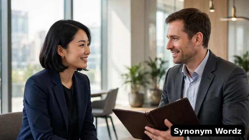 Two professionals having a polite conversation in a bright modern office