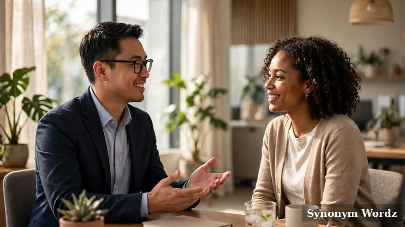 Two professionals having a friendly conversation in a modern office
